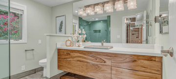 Guest bathroom essentials including botanical soap, soap dish and natural-bristle bath brush