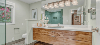 Guest bathroom essentials including botanical soap, soap dish and natural-bristle bath brush